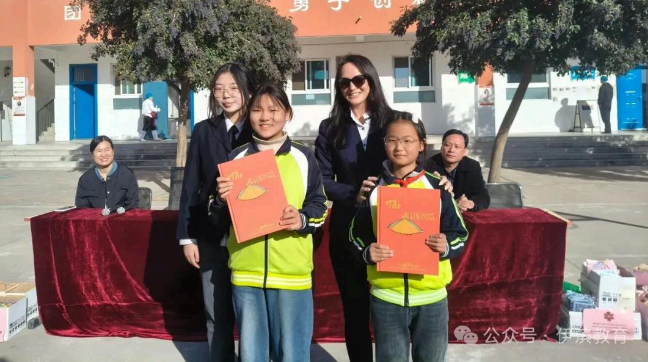 Student volunteers interacting with children during teaching activities